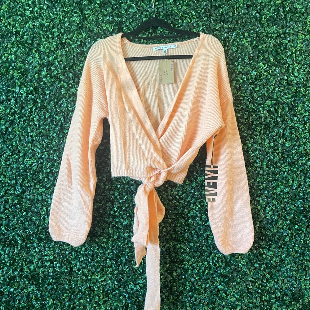 Peach long sleeve wrap style crop top